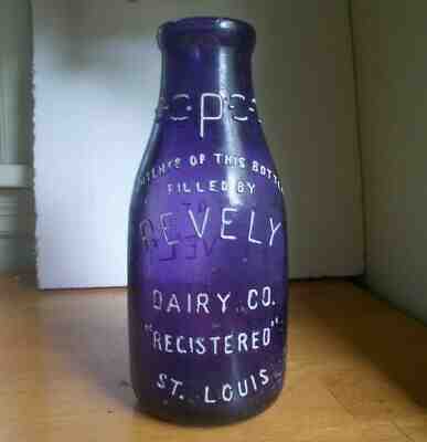 PEVELY DAIRY CO.ST.LOUIS AMETHYST PURPLE QUART MILK BOTTLE OVER 100 YEARS OLD