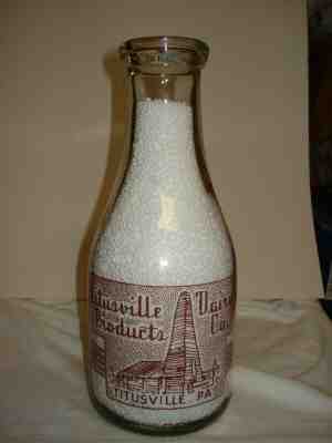 TRPQ Titusville Dairy Titusville, Pa. Crawford Co. 1945 War Slogan Milk Bottle 
