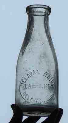 Delavan Dairy C. A. Bright Delavan, ILL IL Embossed Quart Milk Bottle