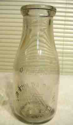 LOS ANGELES PINT SIZE MILK BOTTLE - OUR OWN DAIRIES - 6 POINT STAR
