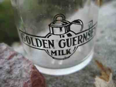 a Heatherwood Farms dairy coffee creamer milk bottle Lansing MI. Golden Guernsey