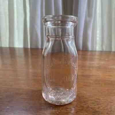 VINTAGE HALF PINT EMBOSSED SLUG MILK BOTTLE GUERS DAIRY TUMBLING RUN , PA