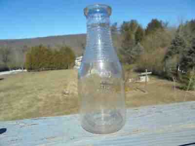 Penn's Creek Pa Yarger Brown Swiss 1Qt Embossed Dairy Milk Bottle.