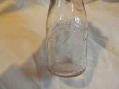 Schneider and Sons Dairy Lake Leelanau, MICH MI Embossed Half Pint Milk Bottle