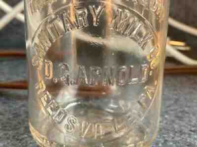 #76 TREHP REEDSVILLE PA SANITARY D.G. ARNOLD FARM DAIRY HALF PINT MILK BOTTLE