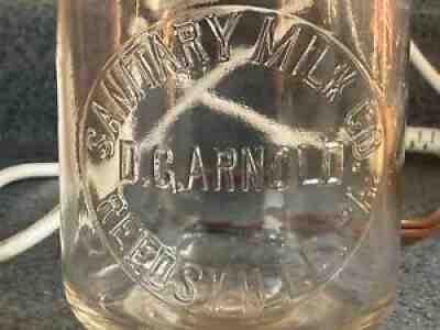 #74 TREQ REEDSVILLE PA SANITARY D.G. ARNOLD FARM DAIRY MILK BOTTLE