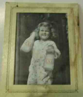 vintage photo of girl with IXL milk bottles