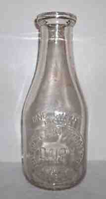 Highland Farms Dairy Greensburg, PA. Embossed Quart Milk Bottle