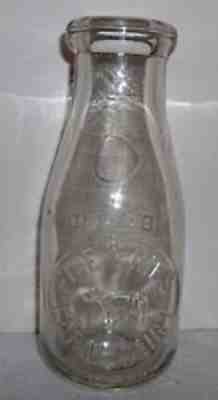 Five Pines Farm Dairy McKeesport PA. Embossed Pint Milk Bottle Full Bodied Cow