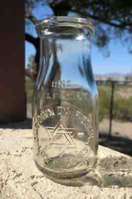 **WESTERN MILK**HALF PINT**OUR OWN DAIRIES**LOS ANGELES**SIX POINT STAR**NICE**