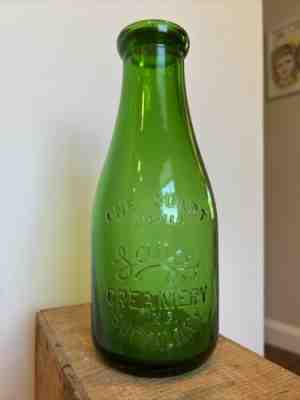 Quart Embossed Milk Bottle - Langâ??s Creamery - Buffalo NY - New York