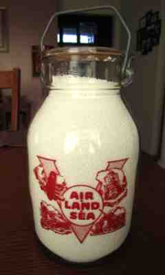 GALLON 1940's SANIDA Erie PENNSYLVANIA dairy WWII milk PA. bottle WAR SLOGAN