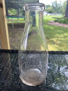 Quart Round Embossed Slug Plate Moore & Crawford Benton IL Illinois Milk Bottle