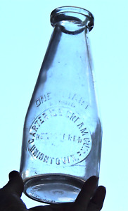 Carter Ice Cream Co. Uniontown, Pa. Round Embossed Quart Milk Bottle