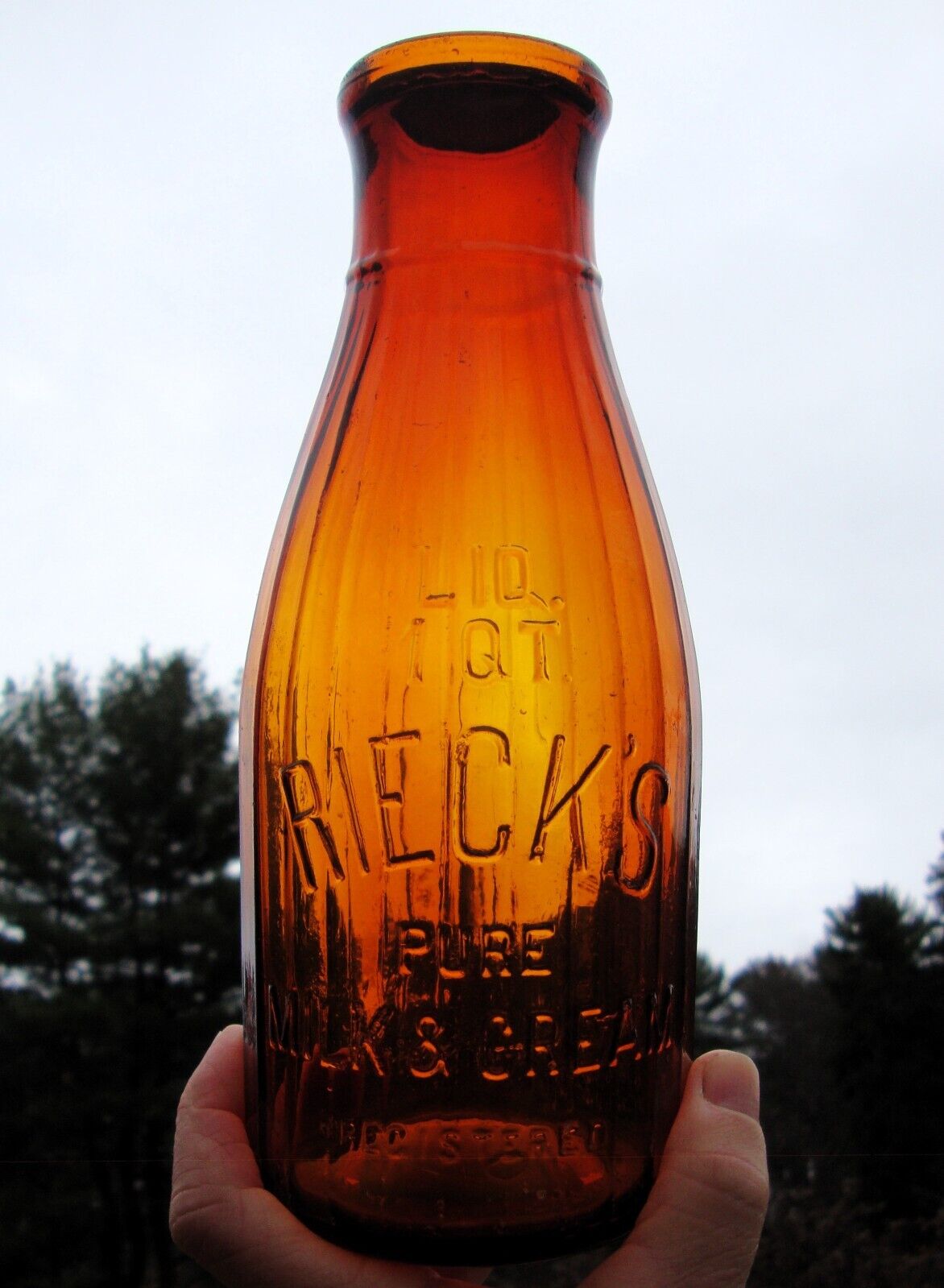 REICK'S RARE LIGHTER AMBER PANELED QUART PITTSBURGH, PENNSYLVANIA MILK BOTTLE