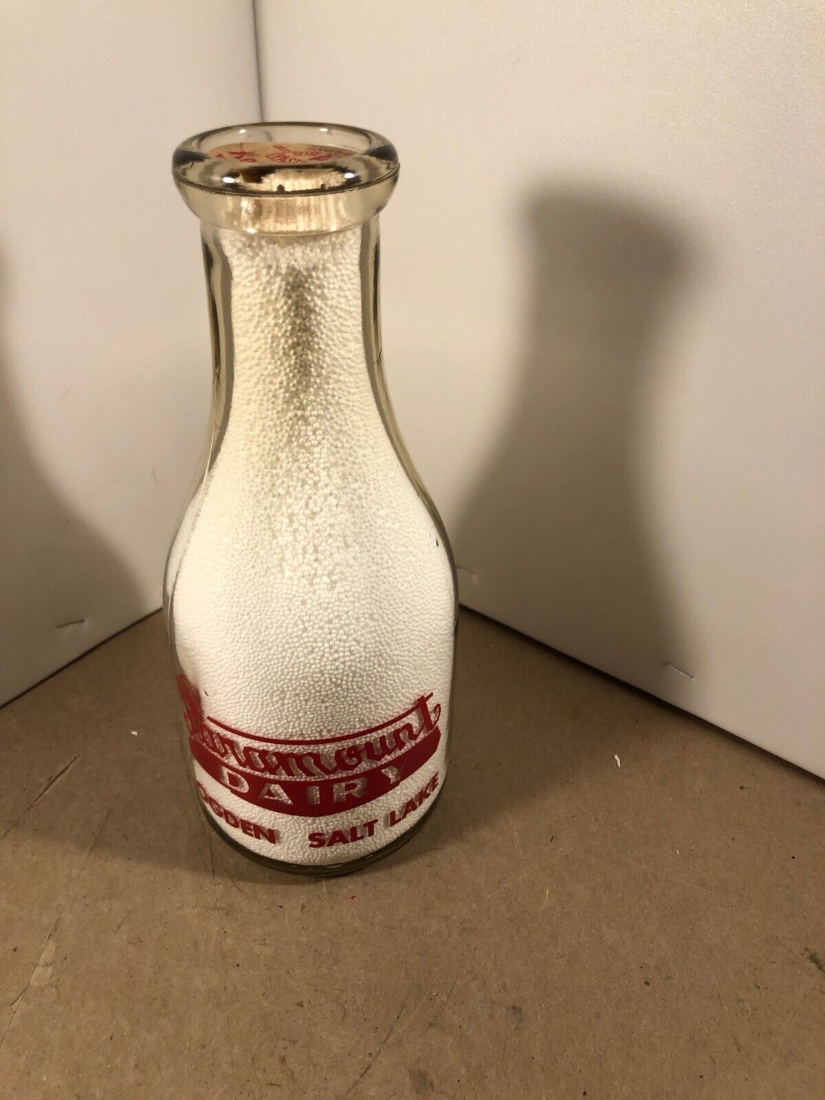 Paramount Dairy quart milk bottle, Ogden, Salt Lake Utah,, kids Roller skating