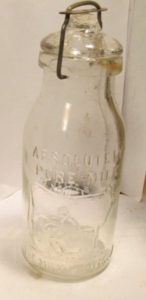 antique milk bottle-Original thatcher pint complete/lid,clamp man milking cow