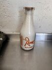 Arnold W. Rowe - Milk Bottle Quart - Rutland, Vermont