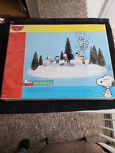 Dept 56 Snoopy Peanuts On Ice Skating Rink