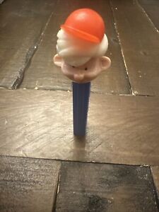 Vintage Boy Pez W/Blonde Hair & Red Cap on a Blue 3.4 No Foot Stem, Austria