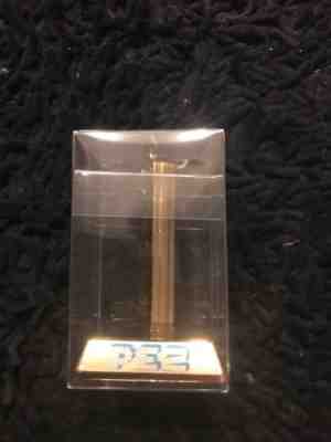 Pez Regular Golden Glow Limited Edition 50th Anniversary mint in box with stand