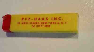 VINTAGE PEZ HAAS NEW YORK ADVERTISING REGULAR RED/YELLOW DISPENSER (NO FEET)