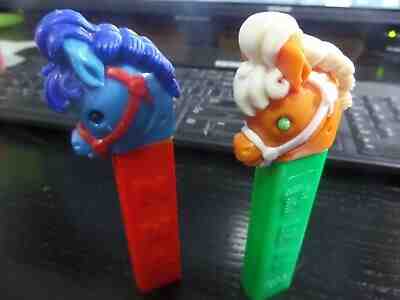 2 PEZ VINTAGE HARD TO FIND  PONY GO ROUND BLUE HORSE & MATT TERRACOTTA MEXICO