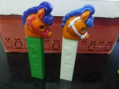 2 PEZ VINTAGE HARD TO FIND  PONY GO ROUND DARK & LIGHT BLUE MANE HORSE 