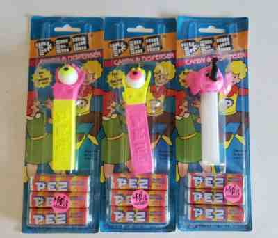Misfit PEZ Lot 2 Psychedelic Eye Yellow Neon Pink Hand plus Elephant Pink Black 