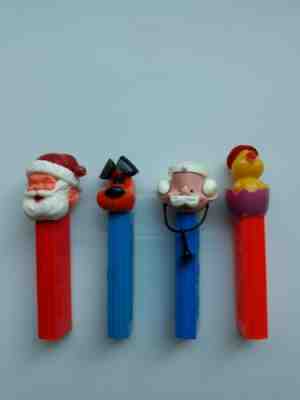 lot of 4 vintage PEZ dispensers  doctor MD Easter chick yappy dog Santa no feet