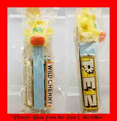 PEZ MIP Vintage YELLOW COW - Light Blue Stem - Holes in cello - No Feet USA 3.8