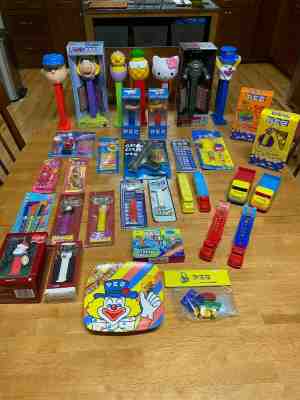 PEZ.  Unique lot of 34.  Trucks, Bank, Popcorn, Card Game, Tall, Watch etc.