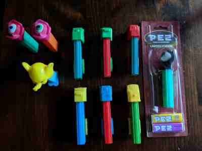 Pez - Mixed Dispensers - Pyschadelic Flowers. Hand, Trucks, & Zinnafant Elephant