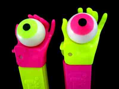 RARE Ltd Edition NEON Psychedelic Eye/Hand Pez Set of 2  $3.99 US Ship