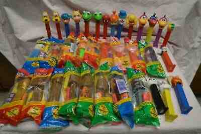35 VINTAGE RARE HARD TO FIND PEZ DISPENSER COLLECTION 17 MINT IN BAG 18 USED