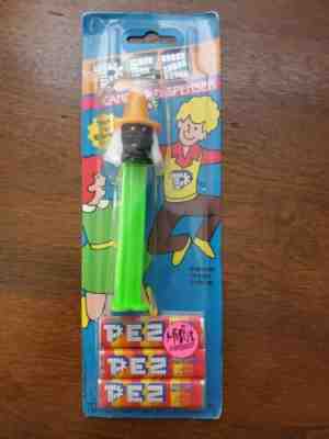 NEW unopened Pez Voodoo Mama Misfit Witch Black Face White Hair Green Stem RARE