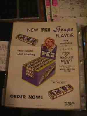 PEZ ad sheet 1956 grape candy pack display box pinup girl salesman