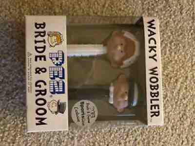 pez dispensers rare wacky wobbler bride & groom,brand new in box.Â 
