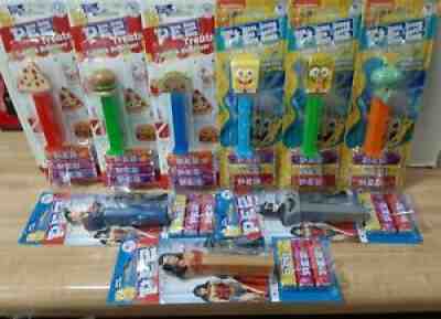 9 Assorted Pez: 3 Treats, 3 Heros, 3 Spongebob Characters, 2 Emojis, Pink Peeps.