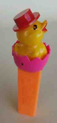 VTG CHICK IN EGG Easter PEZ Dispenser, no feet, ORANGE stem, metal pin, AUSTRIA