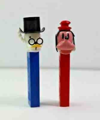 Two Vintage Pez Dispensers Scrooge McDuck Austria Goofy USA No Feet