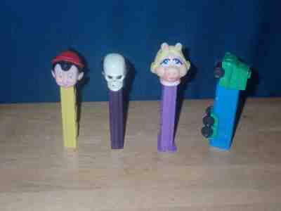 4x Vintage PEZ Dispenser Lot, Pinocchio, Miss Piggy, Skull, Semi Truck Very Nice