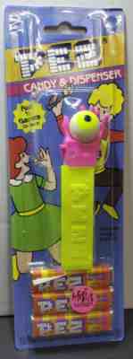 PEZ Misfit Pink Psychedelic Hand / Yellow Stem - New On Card