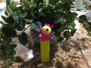 Psychedelic Pink Hand/yellow Eye Neon yellow stem Pez
