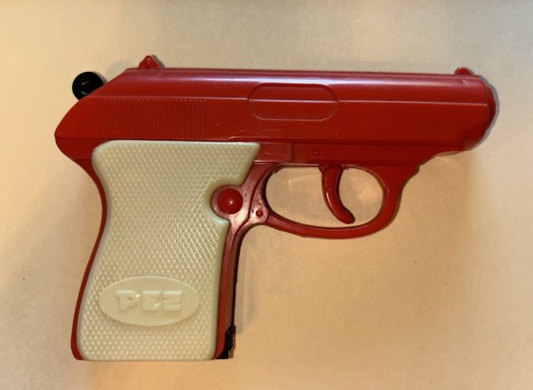 Rare And Collectible Pez Dispensers : Orange Gun Value Guide