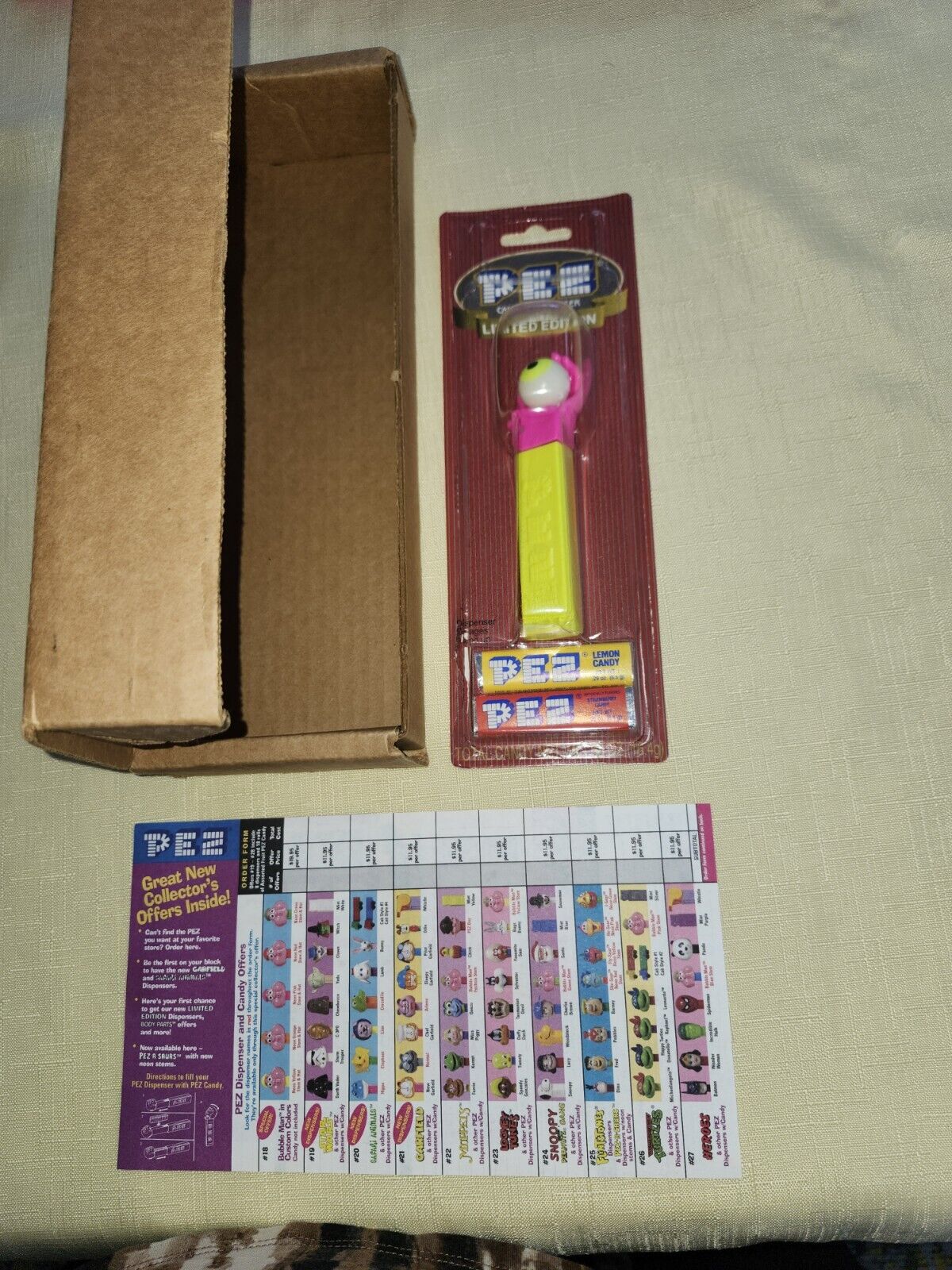 PEZ Misfit Psychedelic Pink Hand And Yellow Stem In MOC Box