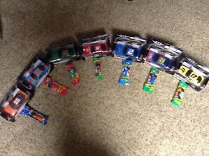 NEW SEALED PEZ DISPENSER LOT SET 7 NASCAR HELMETS PULL AND GO BOXED RACE CARS