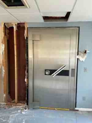 antique bank vault, authentic Diebolt, steel walled with locking security gate.Â 
