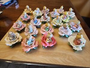 Precious moments expressive blossoms roses With Angel Holding Animal Lot Of 20