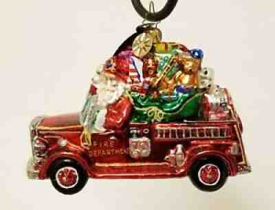 Christopher offers Radko Christmas ornament santa claus figurine fire rescue police cop